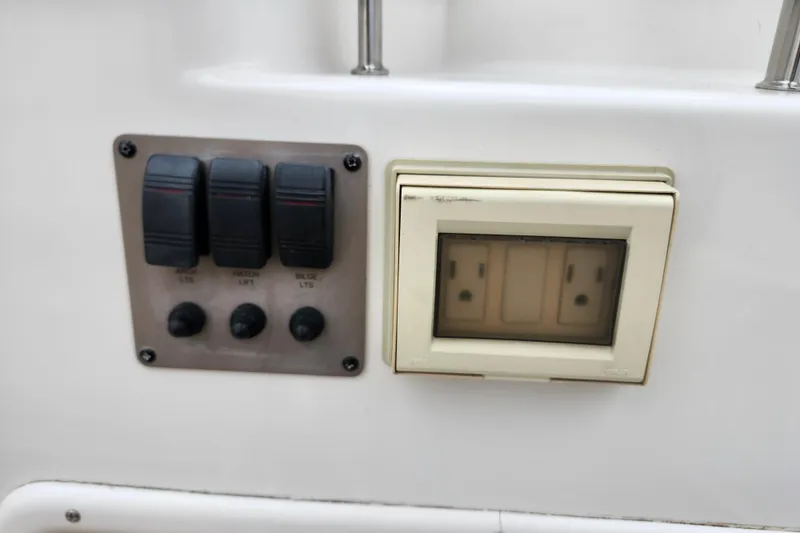 Slide: The Image of Water control panel on a 2011 Regal 3060 Express Cruiser boat. - 18