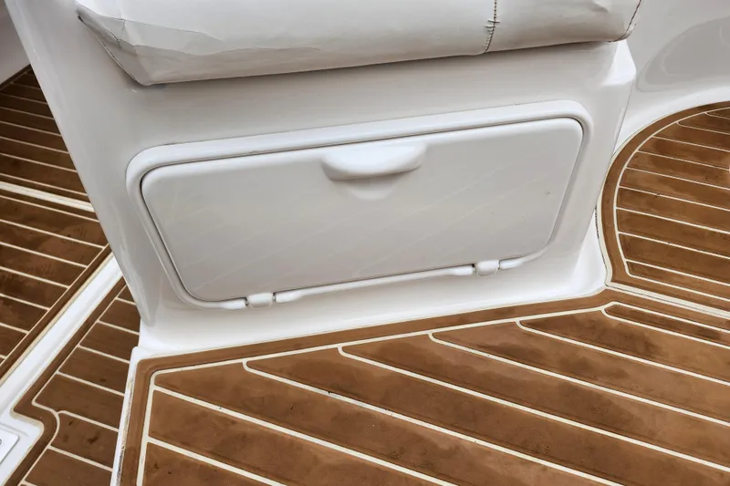 Slide: The Image of Interior view of 2011 Regal 3060 Express Cruiser with covered seating area. - 7