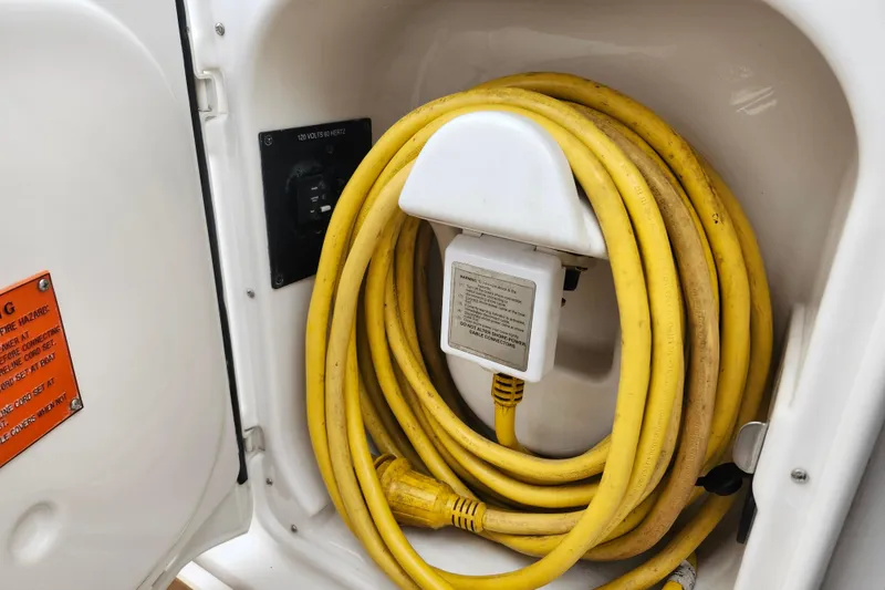 Slide: The Image of DC distribution center on 2011 Regal 3060 Express Cruiser boat. - 9