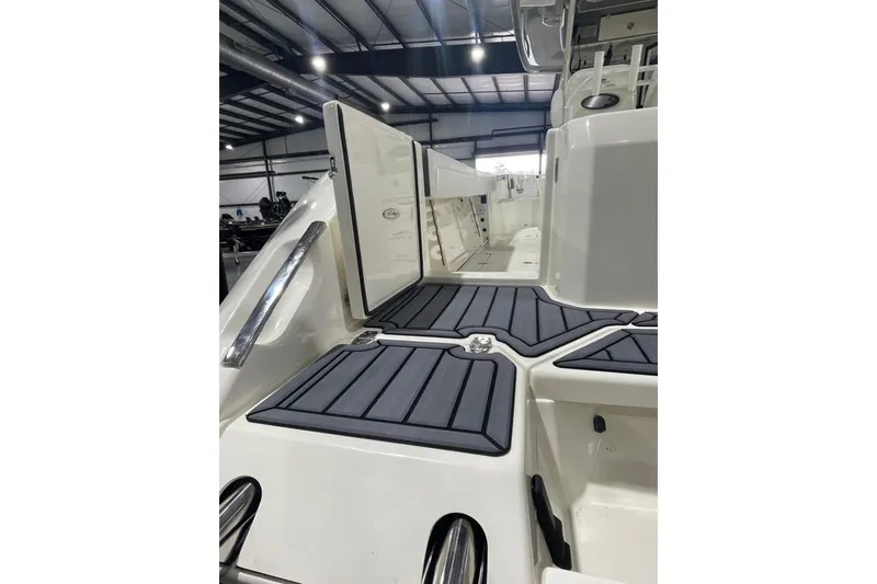 Slide: The Image of 2026 Cobia 285 Open Center Console boat interior with sleek design and modern features. - 6
