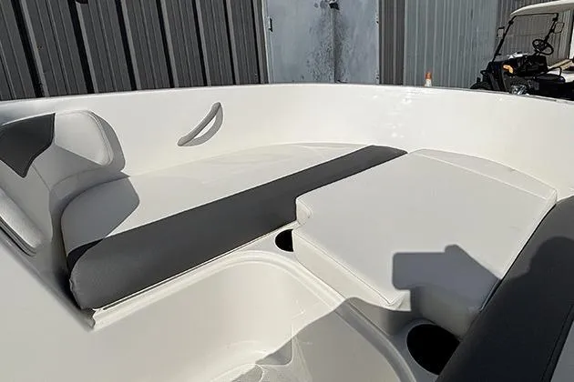 Slide: The Image of 2026 Bayliner Element E18 boat interior with gray and white seating. - 10