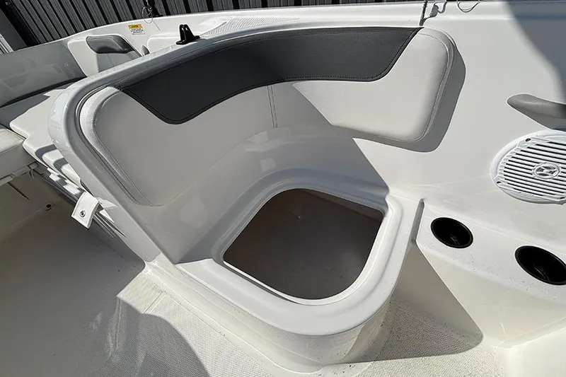 Slide: The Image of 2026 Bayliner Element E18 boat interior with seating and speaker detail. - 9