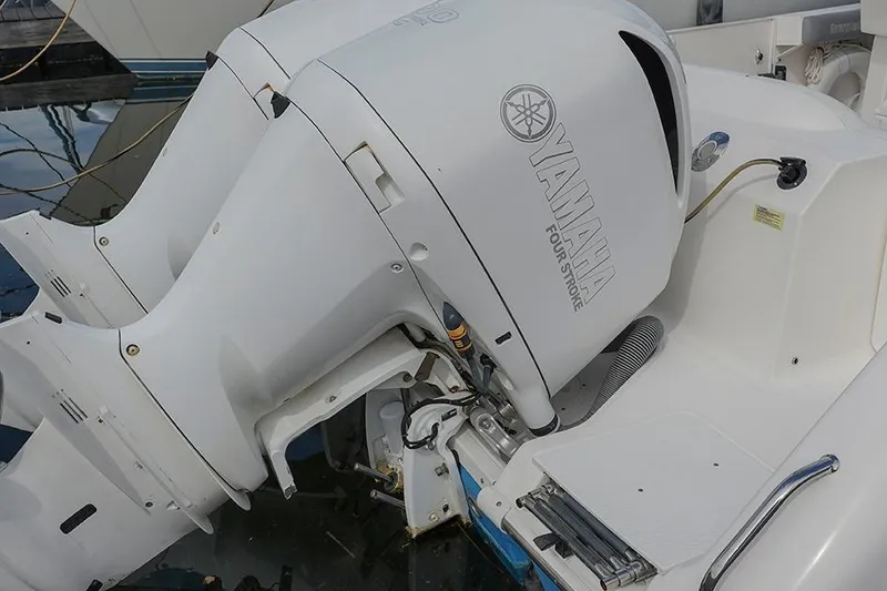 Slide: The Image of Twin Yamaha outboard engines on a 2015 Everglades 295 Center Console boat. - 23