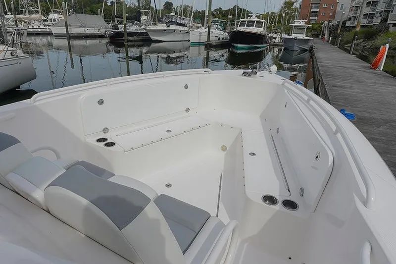 Slide: The Image of 2015 Everglades 295 Center Console boat interior at marina dock. - 6