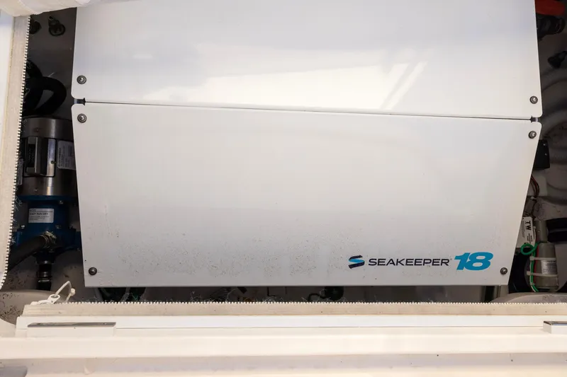 Slide: The Image of Seakeeper 18 stabilizer in 2022 Viking 54 Sport Coupe yacht engine room. - 31