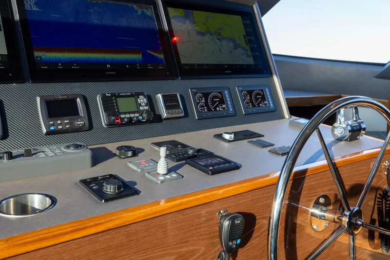 Slide: The Image of Control panel of 2022 Viking 54 Sport Coupe with navigation and communication systems. - 42