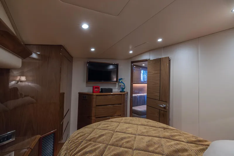 Slide: The Image of Luxurious interior of 2022 Viking 54 Sport Coupe yacht with modern amenities. - 65