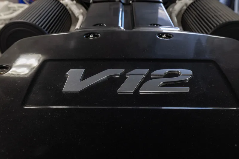 Slide: The Image of V12 engine detail of 2022 Viking 54 Sport Coupe, showcasing power and performance. - 75