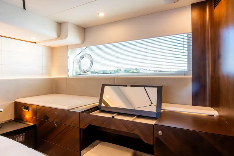Slide: The Image of Luxurious interior of 2026 Fairline Squadron 58 yacht with elegant wood finishes. - 23