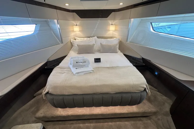 Slide: The Image of Luxurious bedroom interior of 2026 Fairline Squadron 58 yacht with modern design. - 32