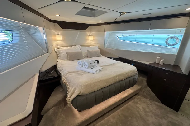 Slide: The Image of Luxurious bathroom in 2026 Fairline Squadron 58 yacht with modern fixtures and branded towels. - 34