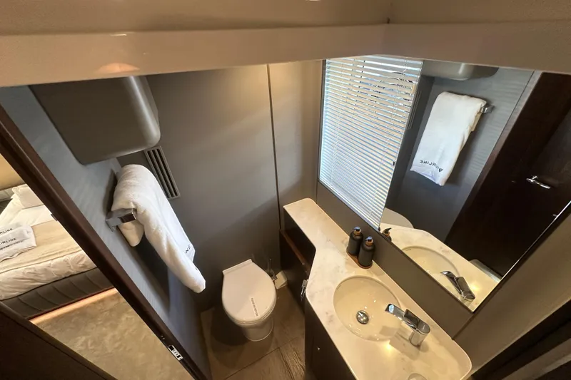 Slide: The Image of Luxurious bedroom interior of 2026 Fairline Squadron 58 yacht with elegant bedding. - 41