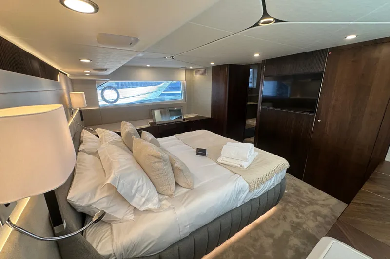 Slide: The Image of Luxurious 2026 Fairline Squadron 58 yacht interior with elegant seating and helm station. - 50