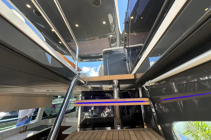 Slide: The Image of Luxury yacht interior of 2026 Fairline Squadron 58 with sleek seating and cabinetry. - 54