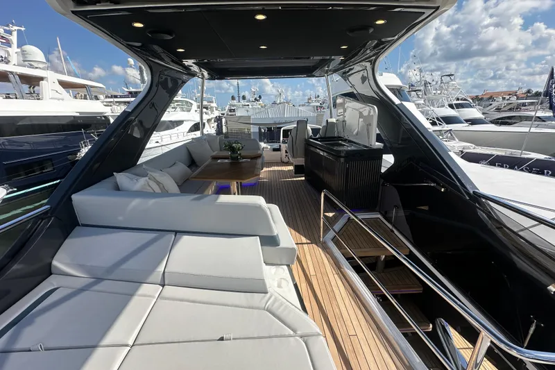 Slide: The Image of Luxury yacht Fairline Squadron 58, 2026 model, featuring elegant deck and seating area. - 66