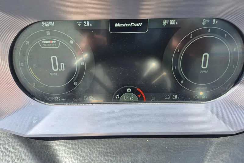 Slide: The Image of Dashboard of a 2022 MasterCraft X24 boat showing speed and RPM gauges. - 17