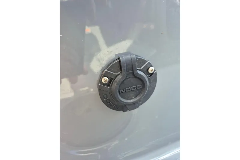 Slide: The Image of Close-up of NOCO charging port on 2022 MasterCraft X24 boat. - 32