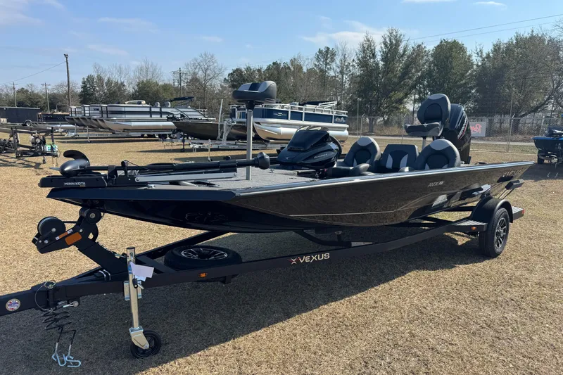 The Image of 2026 Vexus Defender 181 boat on trailer, parked outdoors, side view. - 1