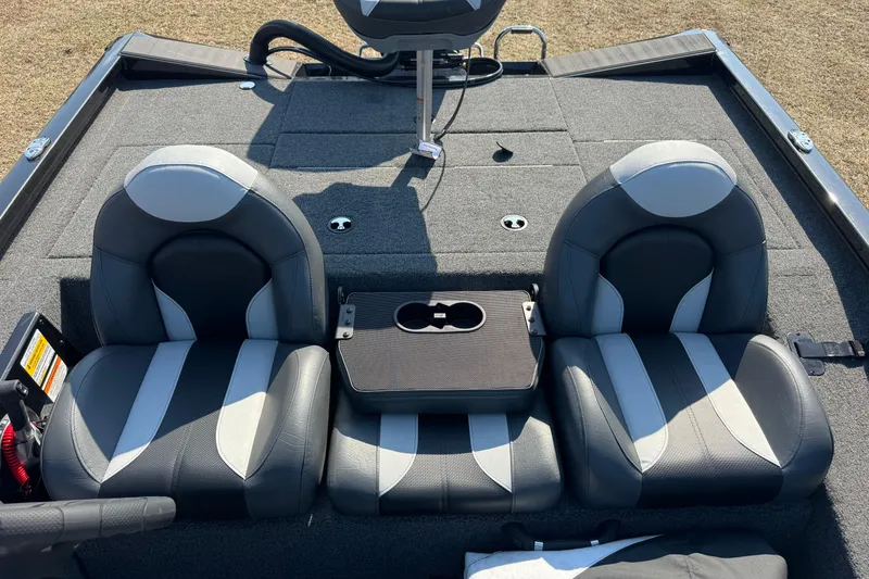 Slide: The Image of 2026 Vexus Defender 181 boat interior with dual seats and center console. - 21
