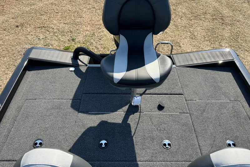 Slide: The Image of 2026 Vexus Defender 181 boat deck with seating and carpeted surface. - 24