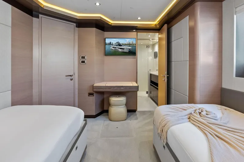 Slide: The Image of Luxurious interior of 2024 Ocean Alexander 35 Revolution yacht with twin beds and modern decor. - 57