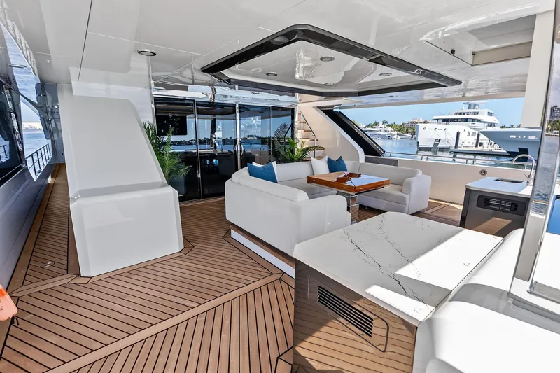 Slide: The Image of Luxurious 2024 Ocean Alexander 35 Revolution yacht interior with elegant seating and modern design. - 20