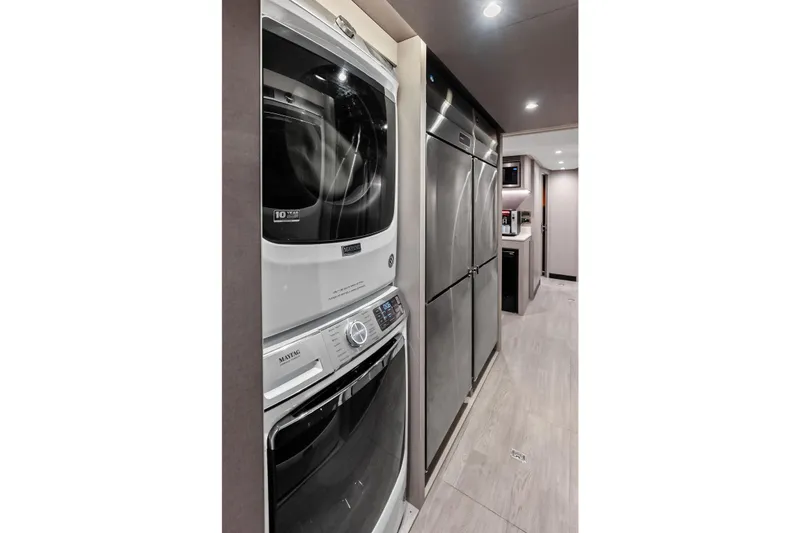 Slide: The Image of Laundry and kitchen area in 2024 Ocean Alexander 35 Revolution yacht. - 61