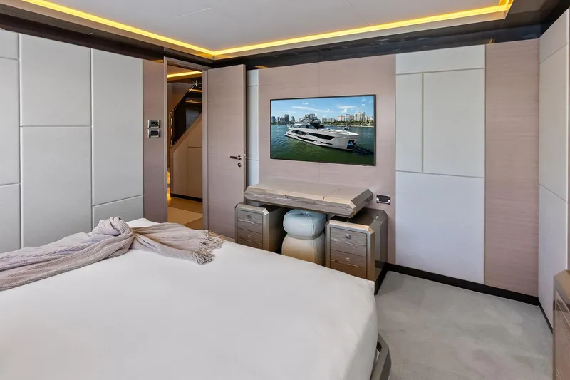 Slide: The Image of Luxurious bedroom interior of 2024 Ocean Alexander 35 Revolution yacht, featuring modern design and elegant decor. - 53