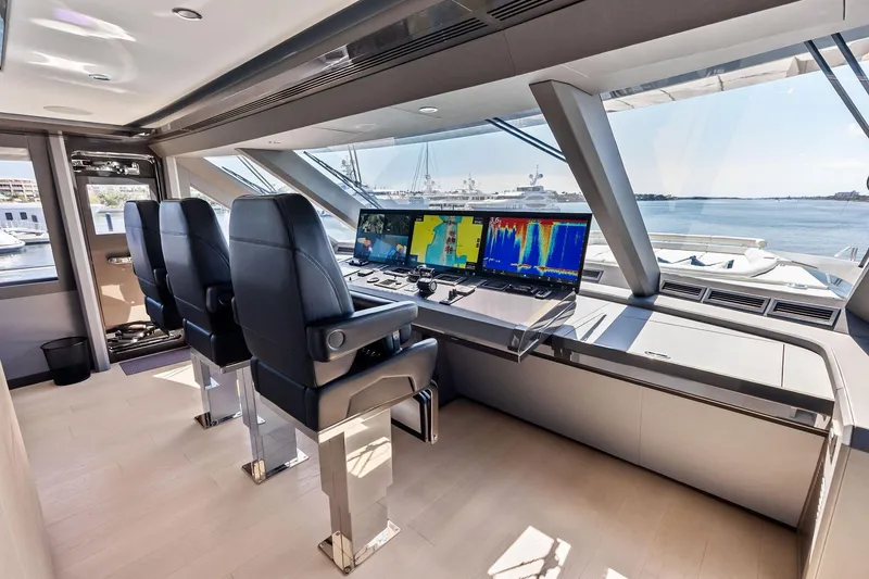 Slide: The Image of Pilothouse of 2024 Ocean Alexander 35 Revolution yacht with advanced navigation systems. - 27