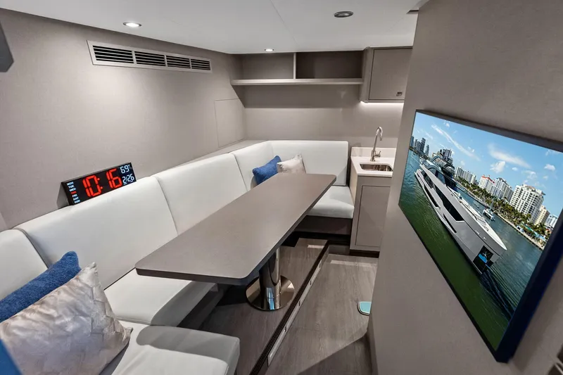 Slide: The Image of Luxurious interior of 2024 Ocean Alexander 35 Revolution yacht with modern seating and TV. - 59