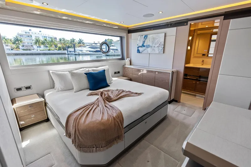 Slide: The Image of Luxurious bedroom interior of 2024 Ocean Alexander 35 Revolution yacht with waterfront view. - 50