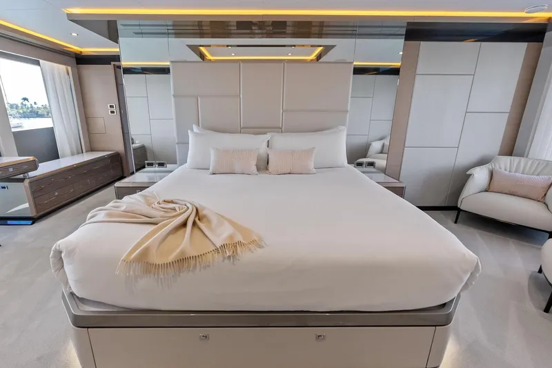 Slide: The Image of Luxurious bedroom interior of 2024 Ocean Alexander 35 Revolution yacht, featuring elegant design. - 44