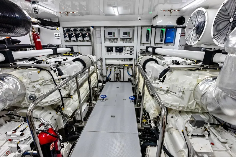 Slide: The Image of Engine room of 2024 Ocean Alexander 35 Revolution yacht, showcasing advanced machinery and controls. - 67