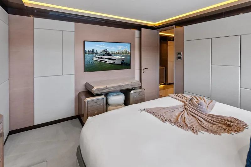 Slide: The Image of Luxurious bedroom interior of 2024 Ocean Alexander 35 Revolution yacht, featuring modern design elements. - 52