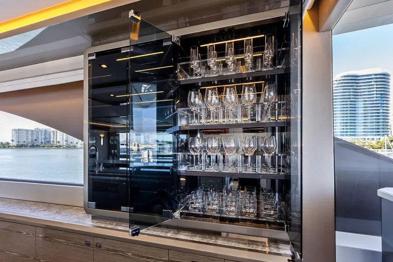 Slide: The Image of Luxurious glassware cabinet on 2024 Ocean Alexander 35 Revolution yacht. - 36