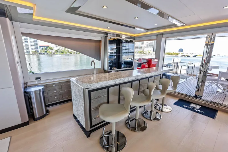 Slide: The Image of Luxurious interior of 2024 Ocean Alexander 35 Revolution yacht with modern bar and seating. - 34