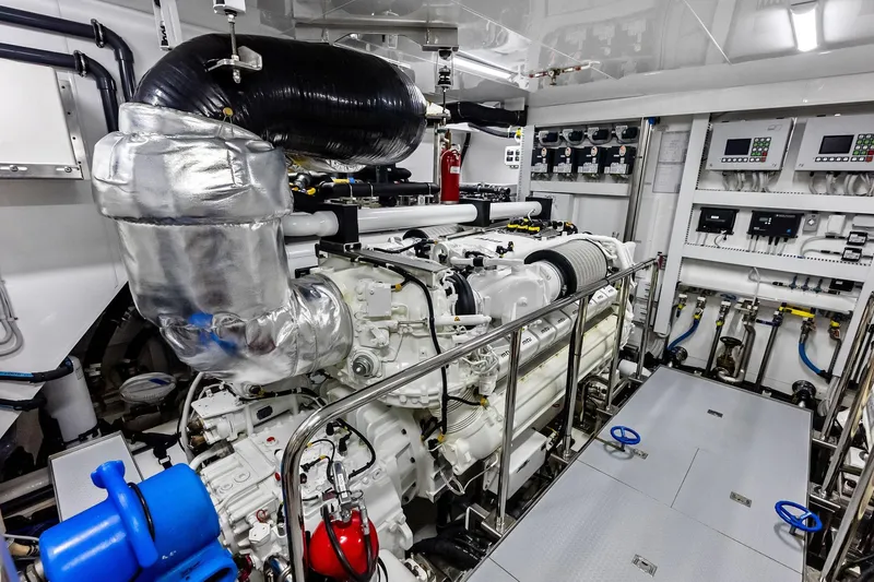Slide: The Image of Engine room of 2024 Ocean Alexander 35 Revolution yacht, showcasing advanced machinery and controls. - 70