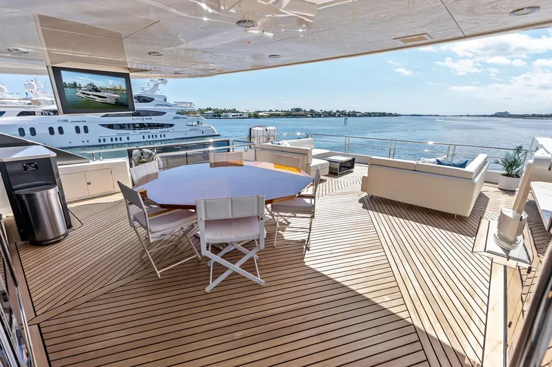 Slide: The Image of Luxurious deck of 2024 Ocean Alexander 35 Revolution yacht with elegant seating and ocean view. - 12