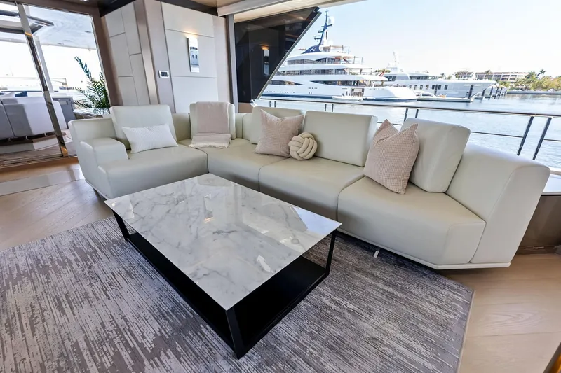 Slide: The Image of Luxurious interior of 2024 Ocean Alexander 35 Revolution yacht with elegant seating and marble table. - 32