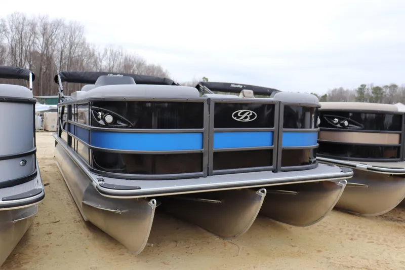 The Image of 2026 Bentley Pontoons Legacy 223 Navigator, sleek design, parked on sandy terrain. - 0