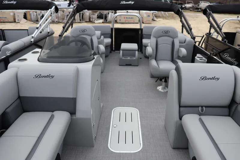 Slide: The Image of 2026 Bentley Pontoons Legacy 223 Navigator interior with luxurious seating and modern design. - 1