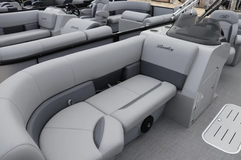 Slide: The Image of 2026 Bentley Pontoons Legacy 223 Navigator interior with luxurious gray seating. - 2