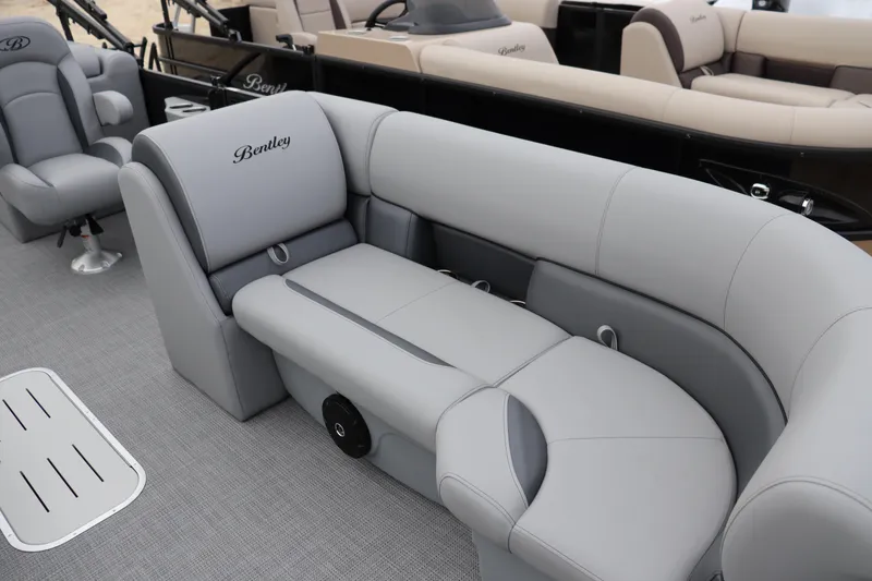 Slide: The Image of 2026 Bentley Pontoons Legacy 223 Navigator interior with luxurious gray seating. - 3