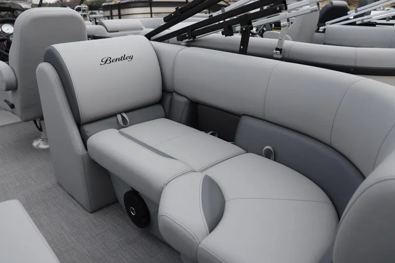 Slide: The Image of 2026 Bentley Pontoons Legacy 223 Navigator interior with luxurious gray seating. - 8