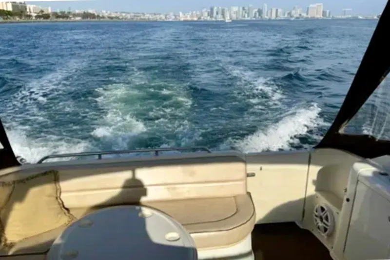 Slide: The Image of Maxum 3700 SCR 2000 model boat interior with sunset view over the water. - 8