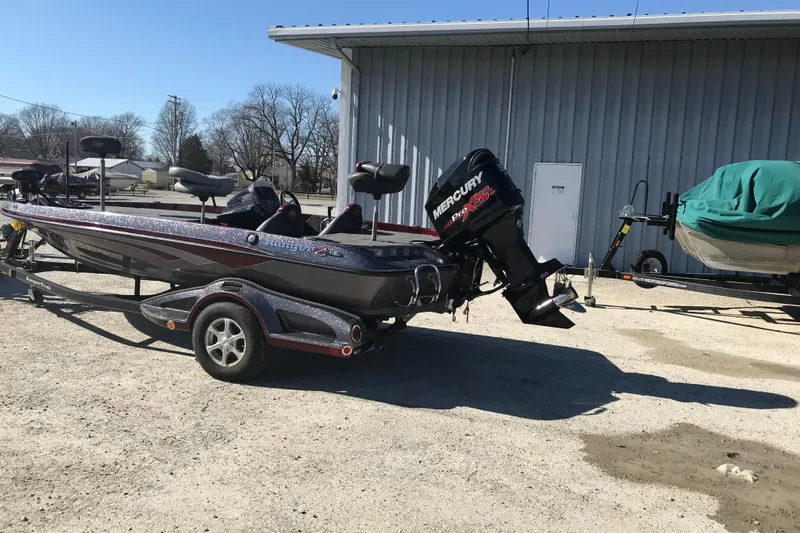Slide: The Image of 2016 Ranger Z118 Comanche boat with Mercury Pro XS engine on trailer. - 13