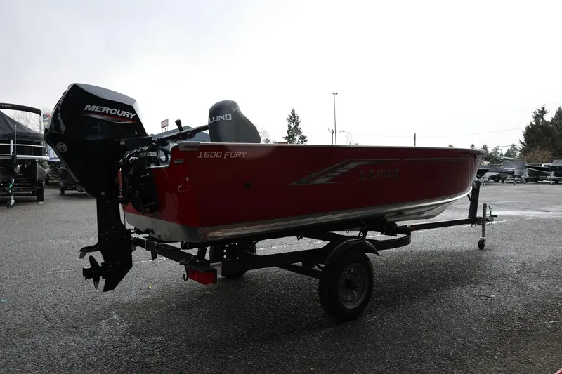 Slide: The Image of 2026 Lund 1600 Fury Tiller boat with Mercury engine on trailer. - 9