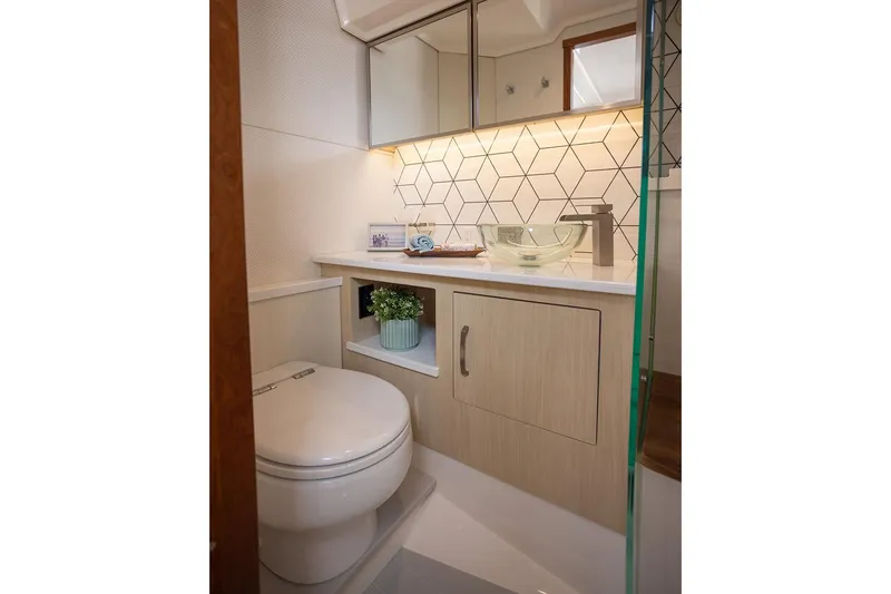 Slide: The Image of Manufacturer Provided Image: Modern bathroom in 2026 Regal LX43 yacht with sleek design and geometric tiles. - 19
