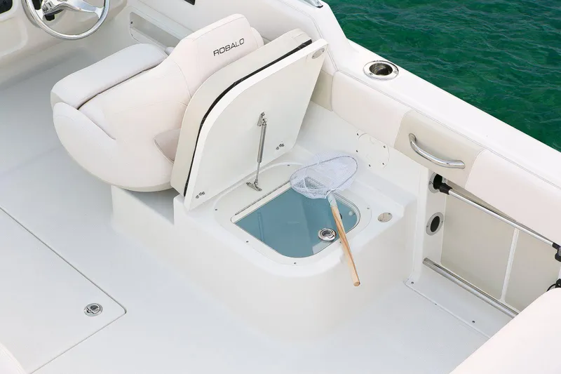 Slide: The Image of Manufacturer Provided Image: 2020 Robalo R227 Dual Console boat interior with livewell and fishing net. - 16