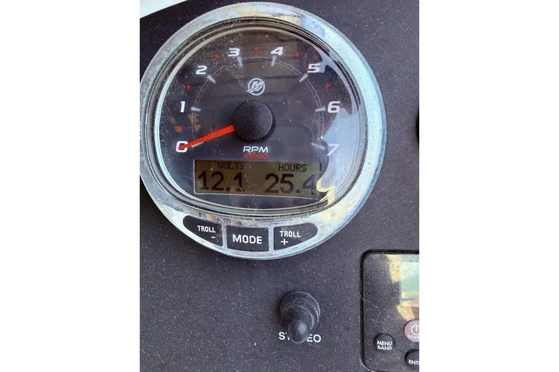 Slide: The Image of 2020 Robalo R227 Dual Console gauge showing RPM, voltage, and engine hours. - 8